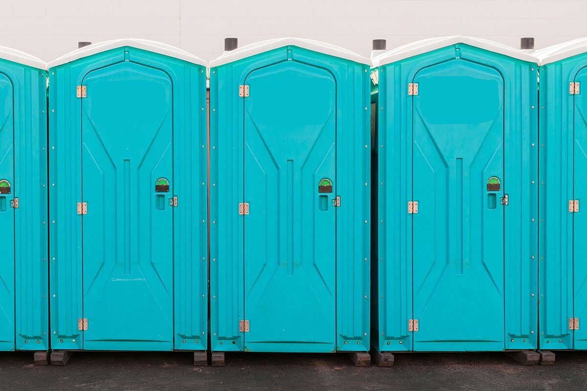 Industrial portable restroom units at a plant in San Jose, California